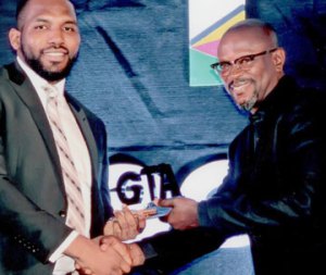 At the Ghana Telecom Awards in May 2015. Ahmed Adama, Aviat Ghana country manager (right) proudly accepts on behalf of all Aviat Networks the honor for  Best Microwave Backhaul Vendor of 2015.
